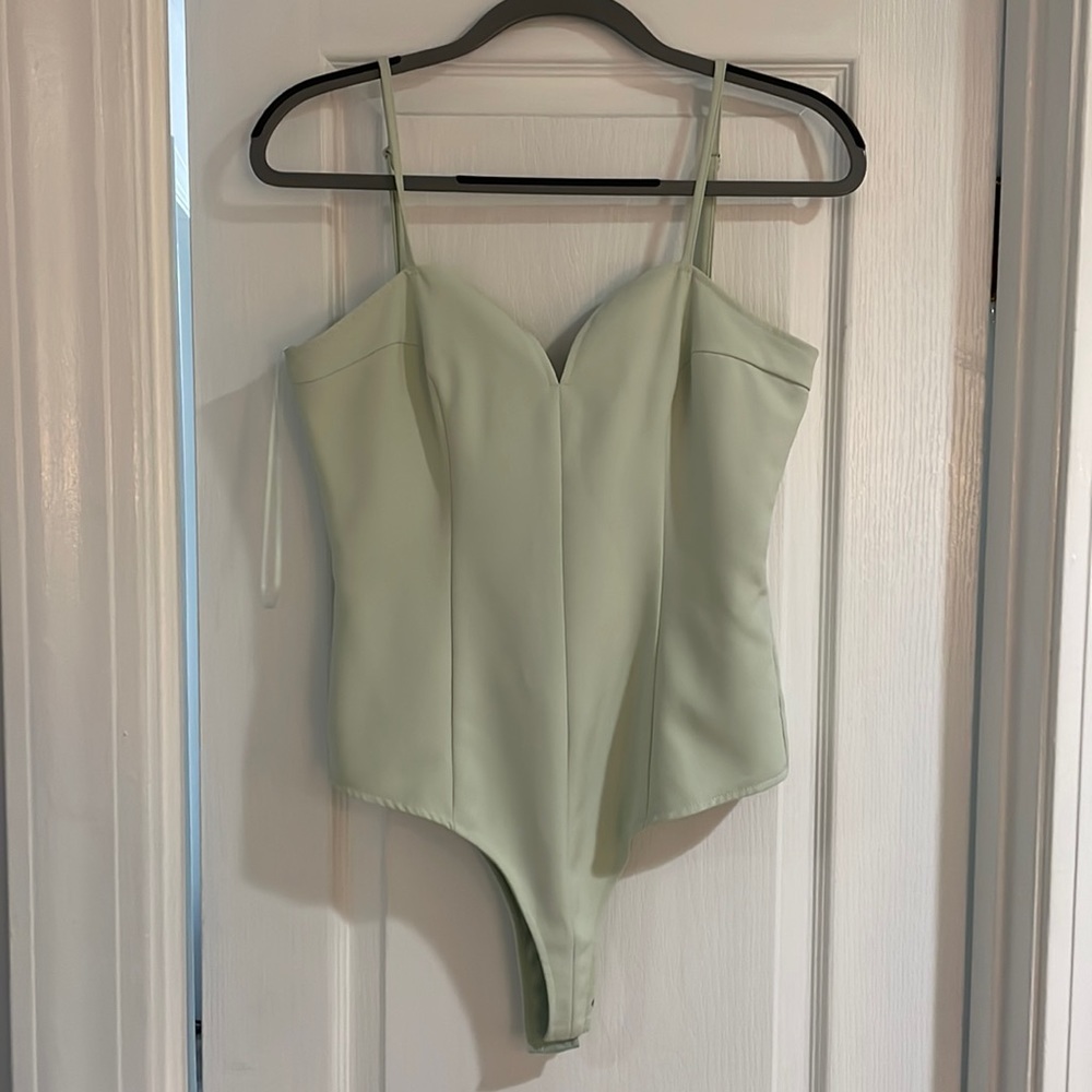 Mint green bodysuit. Size: S